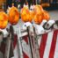 cluster of construction barricades with orange lights